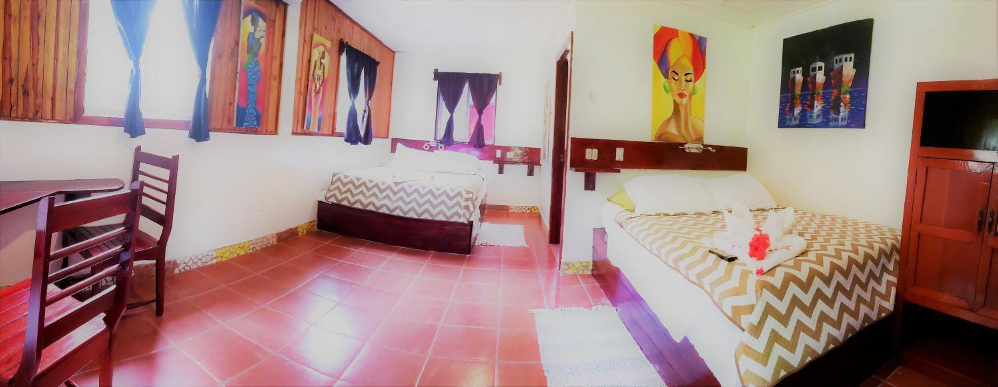 Paraiso Beach Hotel Brig Bay Buitenkant foto