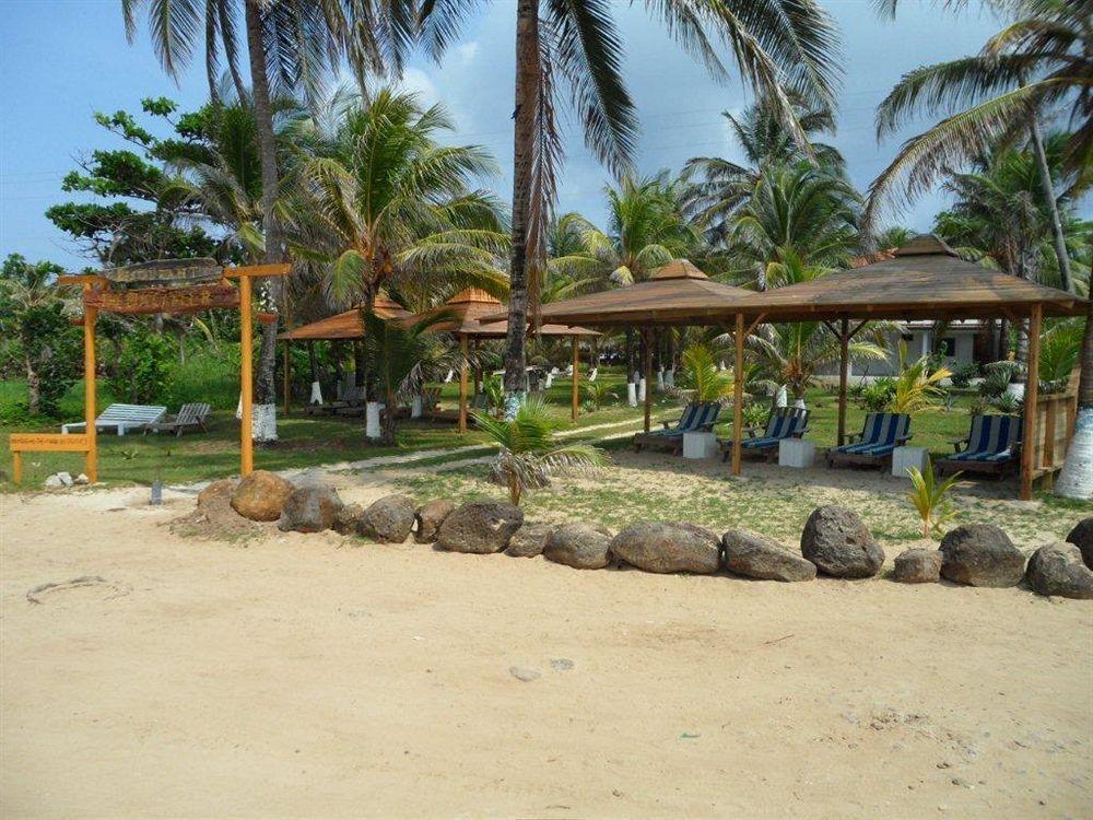Paraiso Beach Hotel Brig Bay Buitenkant foto