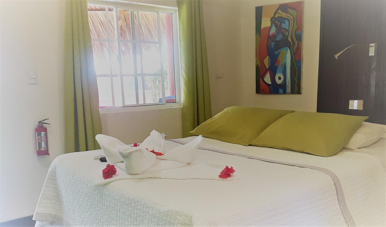 Paraiso Beach Hotel Brig Bay Buitenkant foto
